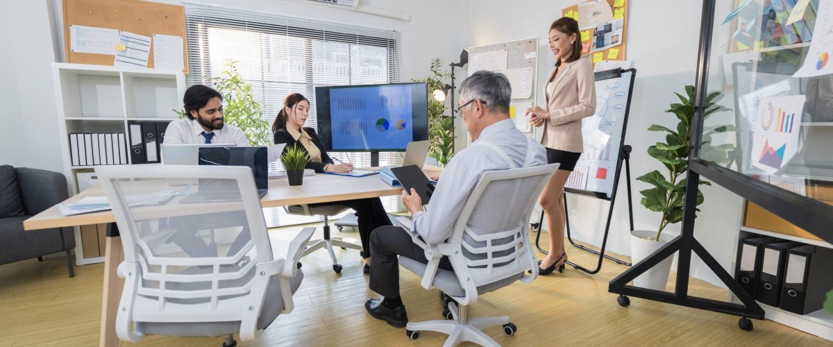 Business Professionals Discussing Project in Modern Office